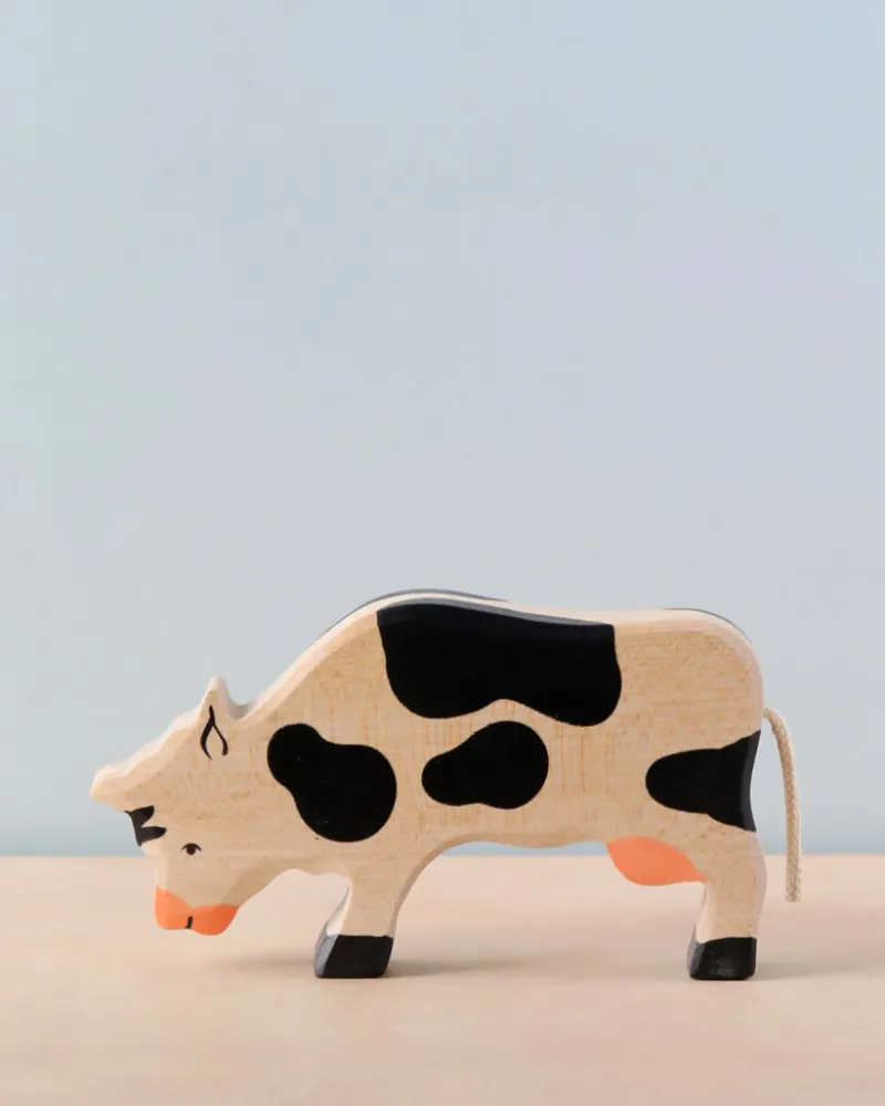 Grazing Black Cow>Holztiger Hot